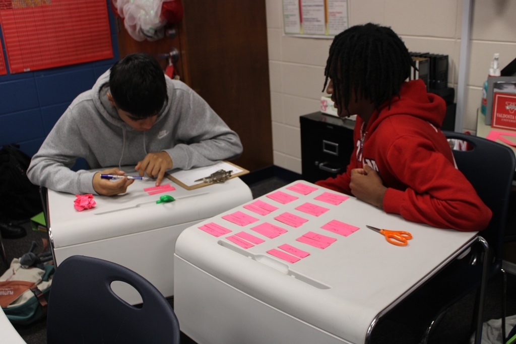 Math students working on activity